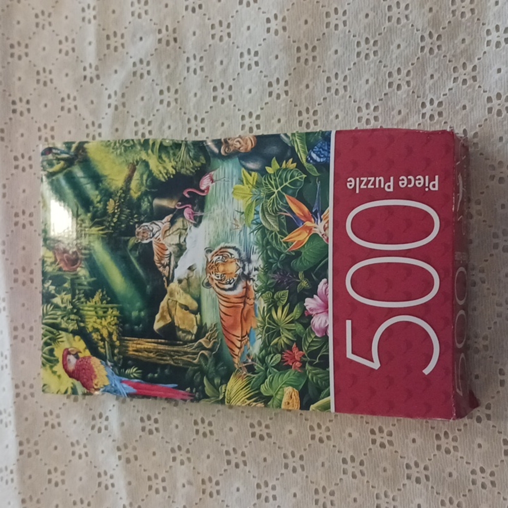 2, 500 piece puzzles. Boxes open, still in original packaging. For both of them.